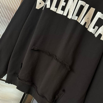 Distressed Street Style Hoodie with Ripped Design